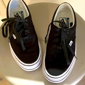 Vans black platform sneakers.